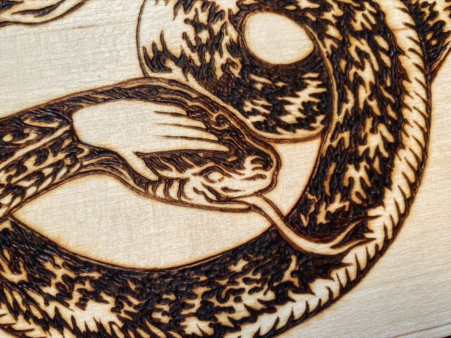 Two Handed, A wood-burned piece