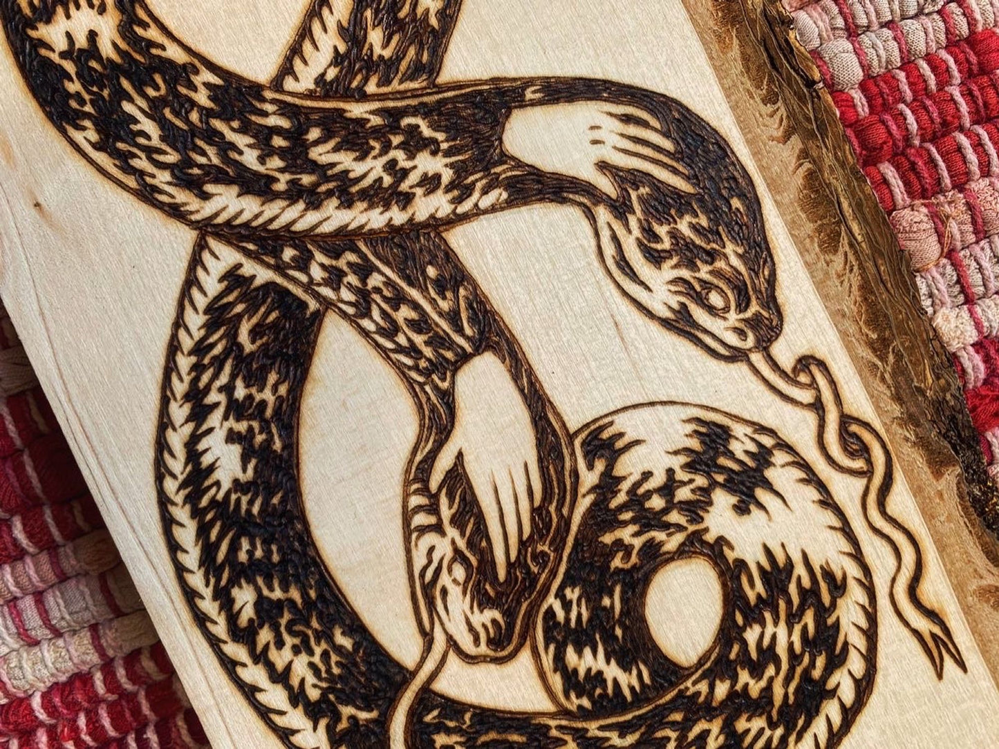 Two Handed, A wood-burned piece